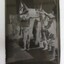 Negative transfer on glass dry plate, photograph shows three men holding a large fish 