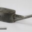 Metal container with a long spout and scale.