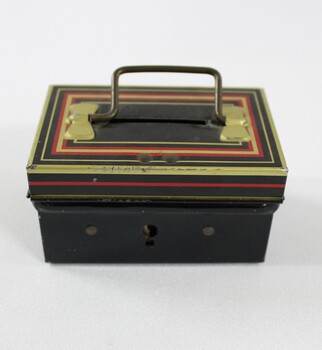 Chad Valley Money Tin c. 1930s-1950s, small black tin with handle and coin slot on lid
