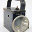 Front view of a rectangular metal lamp.