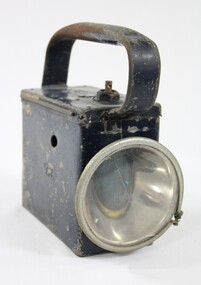 Front view of a rectangular metal lamp.