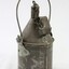 Back metal container with looped handle. 