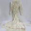 A silk wedding dress with fitted bodice and lace collar