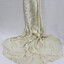 A silk wedding dress with fitted bodice and lace collar