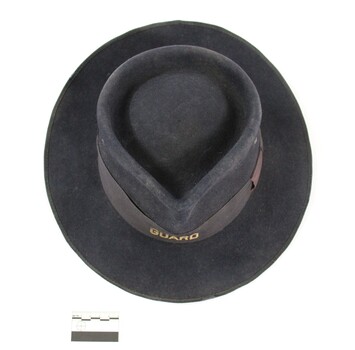 Dark blue/grey felt Victorian Railways hat with scale.