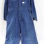 Front of blue Victorian Railways work coveralls, with a black and white 5 cm scale.