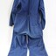 Back of blue Victorian Railways work coveralls, with a black and white 5 cm scale.