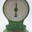 Front of the green painted cast iron scales.