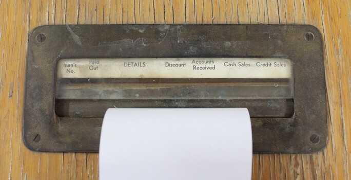 Invoice slot on top of wooden till