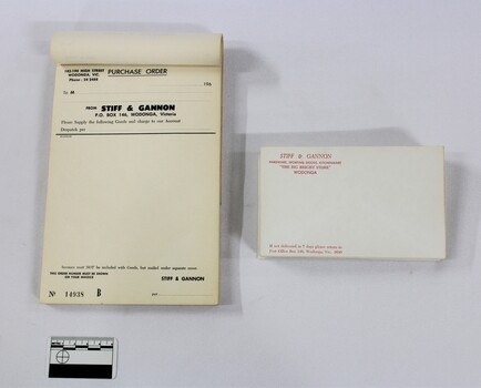 Purchase order book from Stiff and Gannon and collection of printed business envelopes. Stiff & Gannon operated a large general store opening in 1946 with a black and white 5cm scale in the foreground. 
