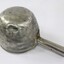 Underside of a large aluminium scoop.