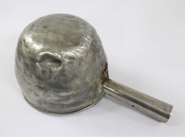 Underside of a large aluminium scoop.