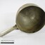 Large aluminium scoop with a handle soldered on one side edge and a black and white 10 cm scale.