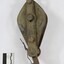 Back of an elongated ellipse-shaped metal pulley.