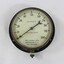 Metal and glass water pump pressure gauge.