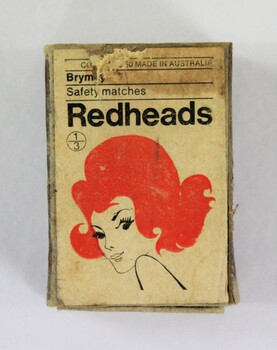 A box of Redhead matches with an illustration of a redheaded woman on the front 