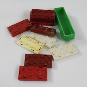 Burgundy, yellow, cream and green children's building blocks 