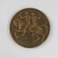 Obverse/front of a circular bronze medal depicting a man and a woman riding a horse, and the words "EQUALITY AND JUSTICE / THROUGH FREEDOM" in raised letters around the edge.