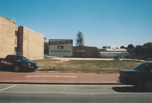 Empty block, former site of the Terminus Hotel. Terminus Hotel name can be seen preserved in the brick work of the path.