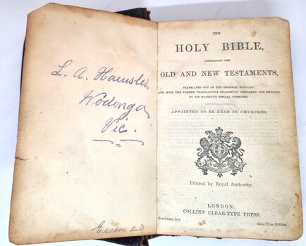 Title page Holy Bible also showing signature of Louis Haeusler