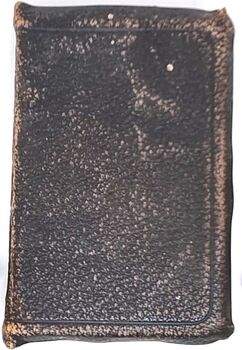 Holy Bible with leather cover - worn with age and use