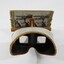 Eyepiece of a stereoscope with cardboard 'view' of a streetscape