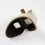 Eyepiece of a stereoscope with cardboard 'view' of a streetscape