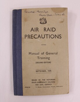 A blue and beige booklet with black text on front cover 