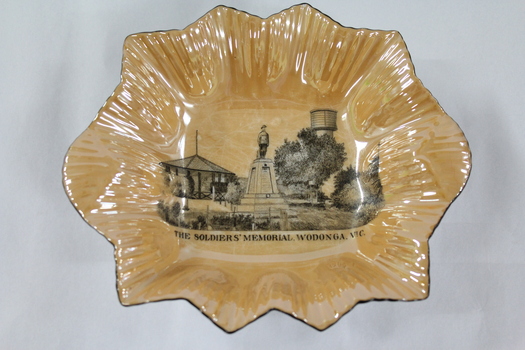 A lustre ware souvenir dish of the Wodonga Soldiers Memorial also including the Water Tower and Rotunda