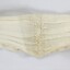 A cream coloured dip-waist belt with metal clasp 