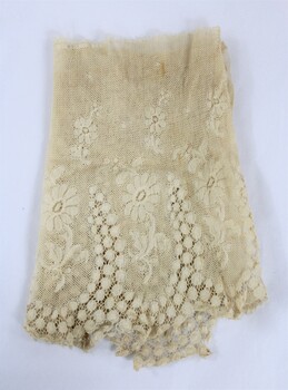 Cream coloured lace with floral motif 