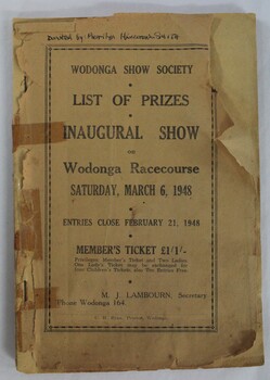 A beige printed booklet featuring lists of prizes for Wodonga agricultural show