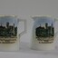 A pair of china jugs with a water colour representation of Woodland Grove, Wodonga including the Soldier Memoria, Rotunda and Water Tower. 