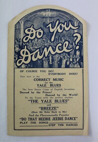 A small paper booklet printed featuring a picture of a crowded ball room, and a list of song titles