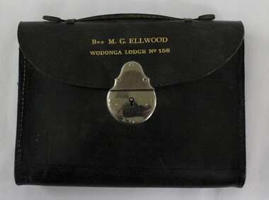 Small black leather case with silver lock 