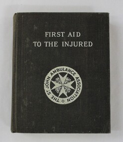 A small black cloth bound book with title and logo printed in white 