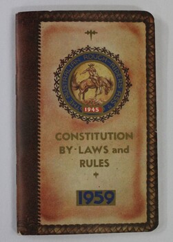 Small tan and brown coloured cardboard booklet