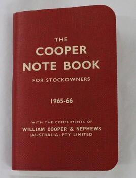Small red booklet with white text embossing 