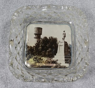 Square crystal dish with coloured image of the Water Tower and Soldiers Memorial in Wodonga, Victoria. Blue backing on base