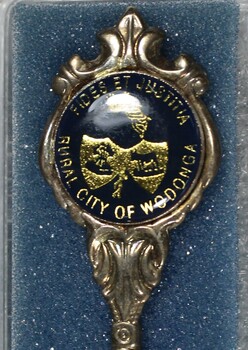 Close up image of the badge of the Rural City of Wodonga at the top of each spoon.