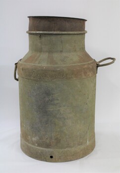 A large metal milk can with handles