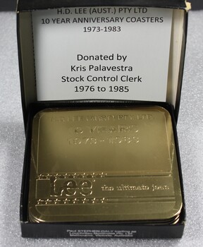 A boxed set of gold coasters with Lee symbol to commemorate 10 years of operation in Albury-Wodonga. 
