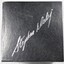 Base of the box showing the signature of the manufacturer Stephen Daly embossed in silver script.