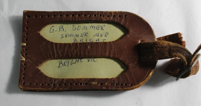 Detachable leather label accompanying Gladstone bag