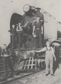 Crewmen preparing Locomotive S300 for journey