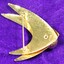 Back of gold-toned metal brooch from the Sarah Coventry Pty. Ltd. with pin clip