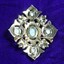  Back of Vintage Sarah Coventry large silver tone brooch with turquoise colored and faux pearl stone 