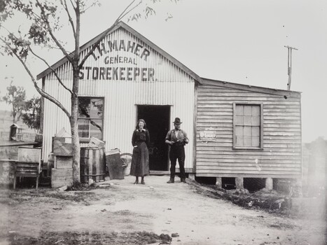 Thomas Maher and his wife Jane standing outside their general store in Ebden, Victoria