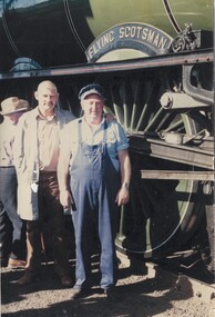 Engine Instructor Jack Brown and Driver Fred Rochow standing in front of The Flying Scotsman