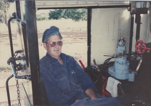Driver Ned Ziebell inside the steam train R761